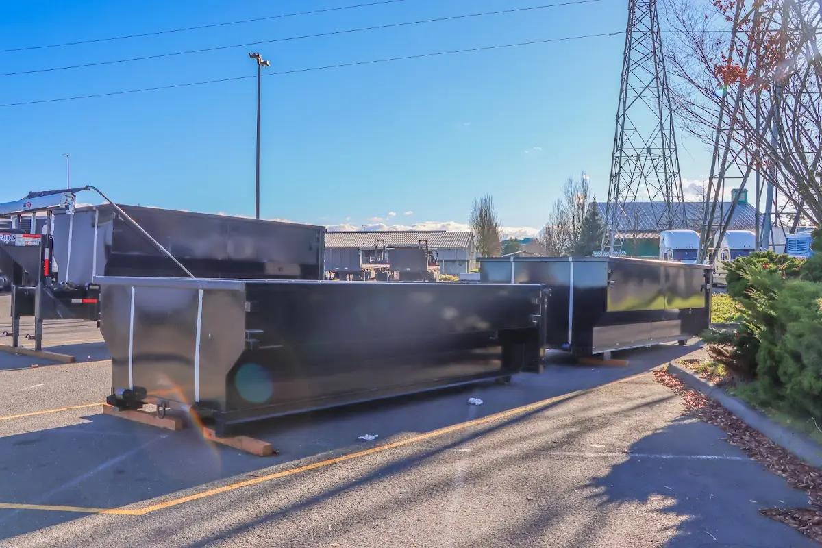 Roll-off dumpster ready for waste disposal at job site for Cleanout Dumpster Rental in Penn Hills